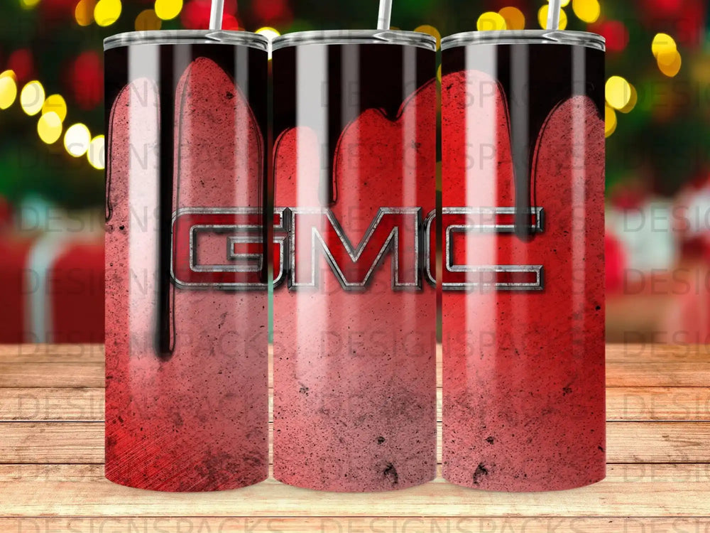 GMC logo with red dripping design on a tumbler.