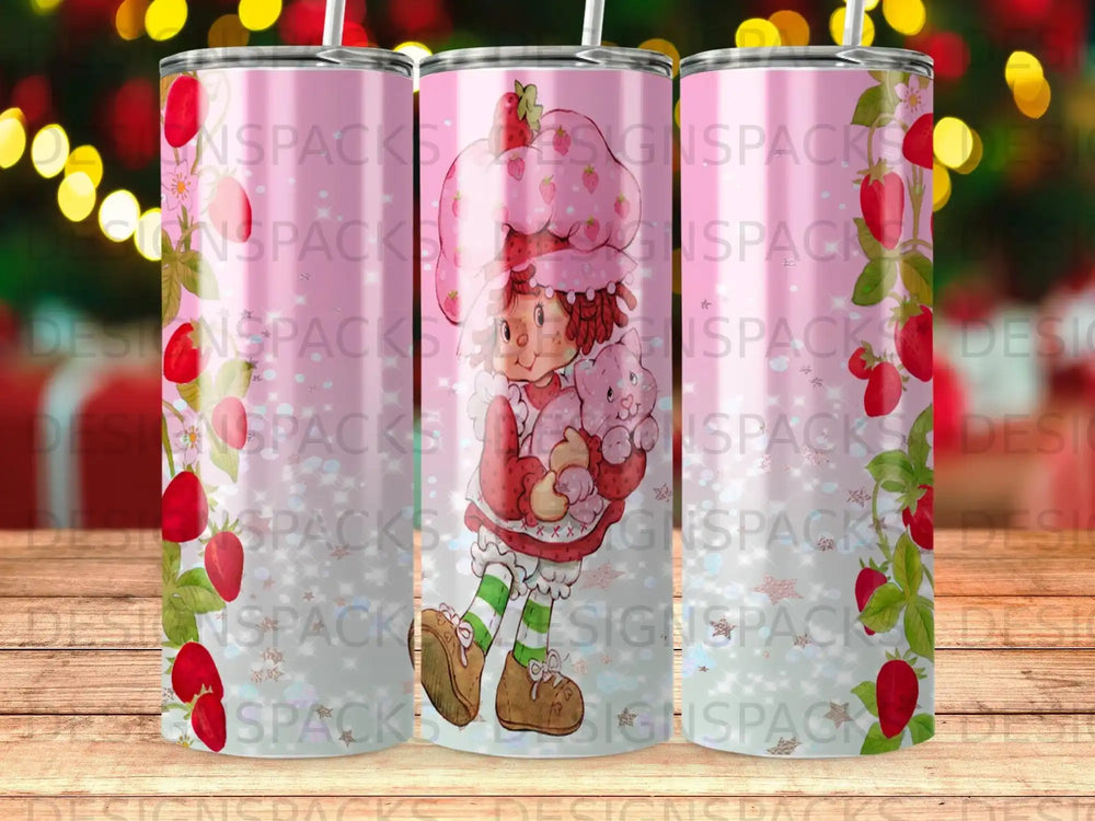 Strawberry Shortcake character holding a pink bear, surrounded by strawberries and glitter.