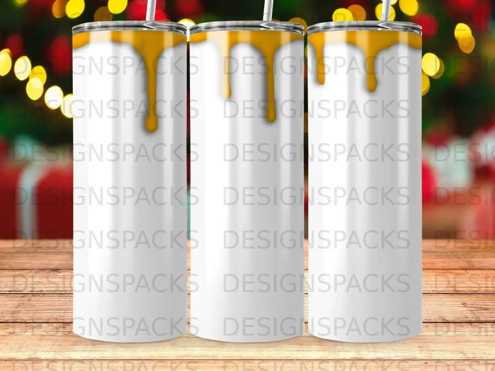 Three tumblers with yellow lids and straws on a blurred background.