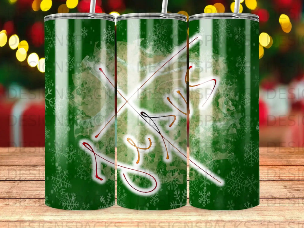 Green tumbler with snowflake pattern and Tic-Tac-Toe design.