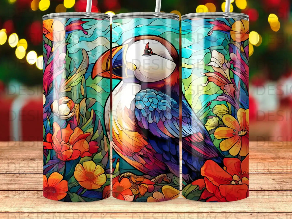 Puffin with colorful floral background, three tumblers in a row.