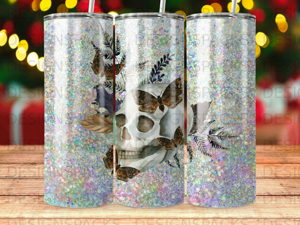 Skull with butterflies and botanical elements on a glittery background.