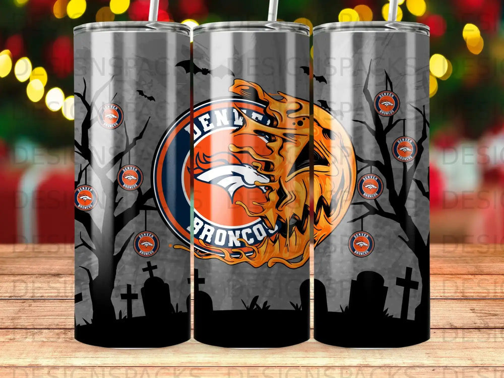 Denver Broncos logo on a Halloween-themed tumbler with spooky trees and tombstones.