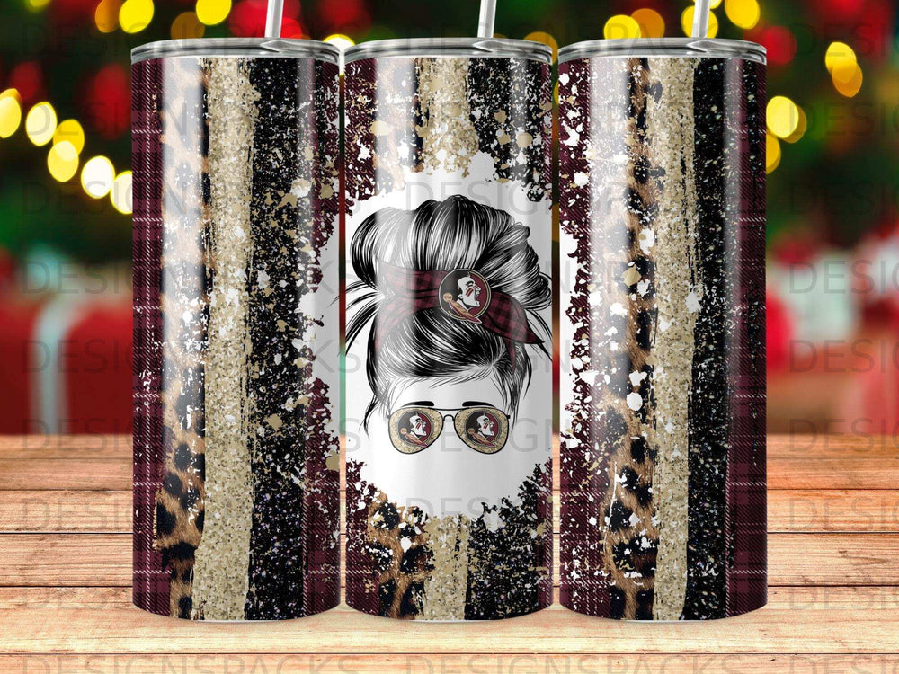 Tumbler with distressed leopard and wood grain pattern featuring a messy bun silhouette.