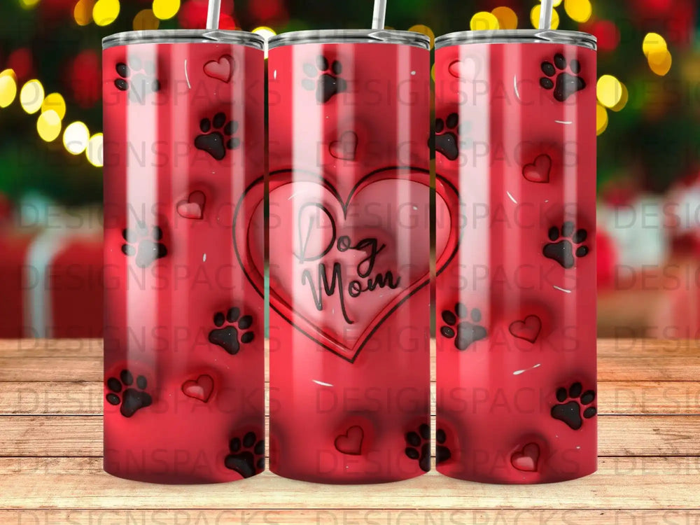 Tumbler with red background, paw prints, and "Dog Mom" text in a heart.