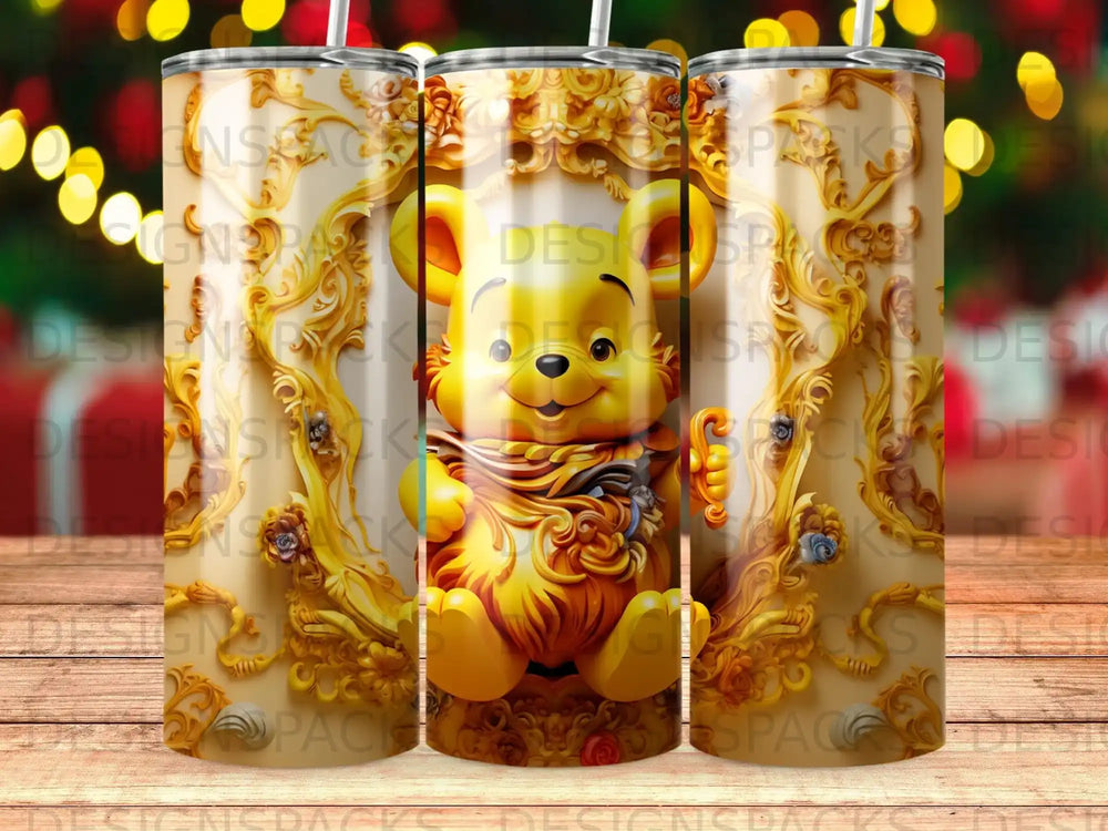 Golden Winnie the Pooh character in ornate frame on patterned tumbler.