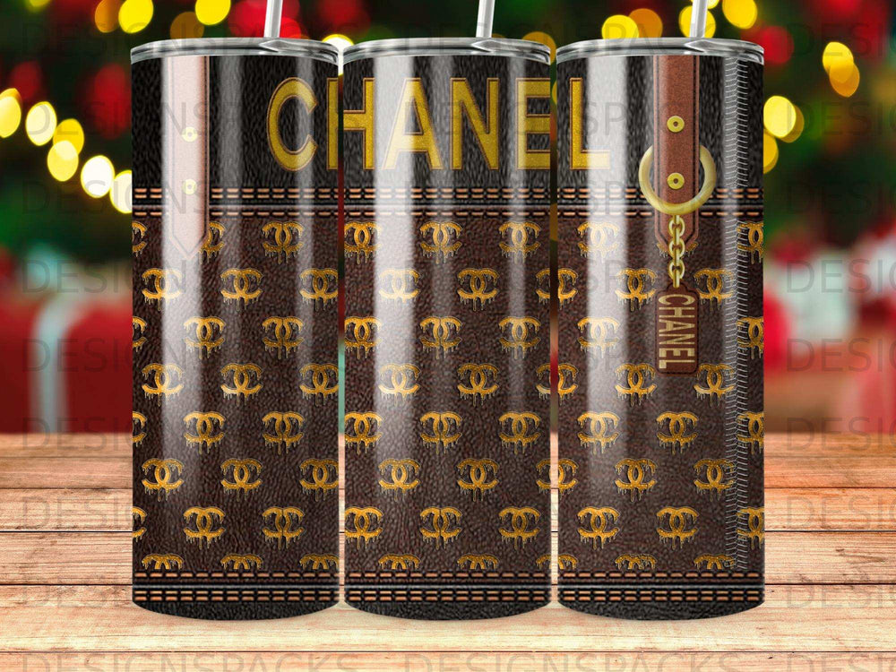 Chanel logo pattern on a brown textured tumbler with gold accents.
