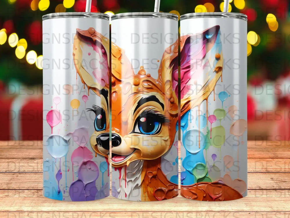 Deer tumbler with colorful paint splatters and large blue eyes.