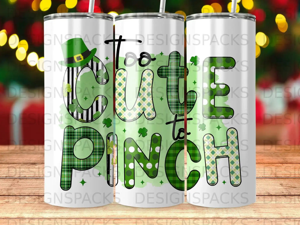 Green plaid "Too Cute to Pinch" text with shamrocks on a tumbler.