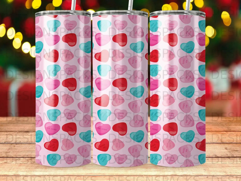 Pink tumbler with scattered hearts, XOXO, and "I love you" text.