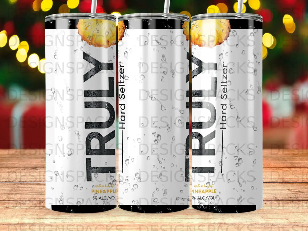 Three Trulys Pineapple Hard Seltzer cans with pineapple slices.