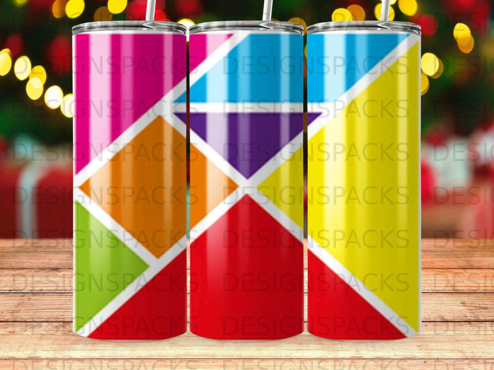 Three tumblers with colorful geometric patterns against a blurred background.