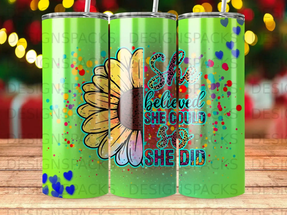 Sunflower with "She believed she could" text on a green gradient tumbler.
