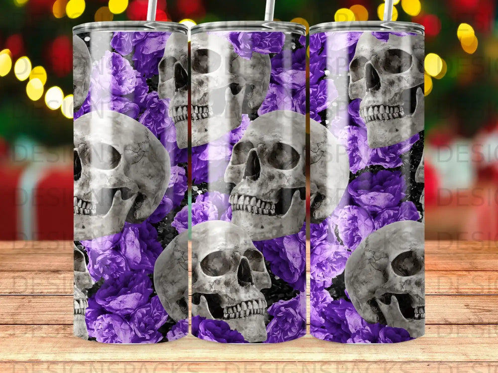 Tumbler with repeating pattern of skulls and purple flowers.