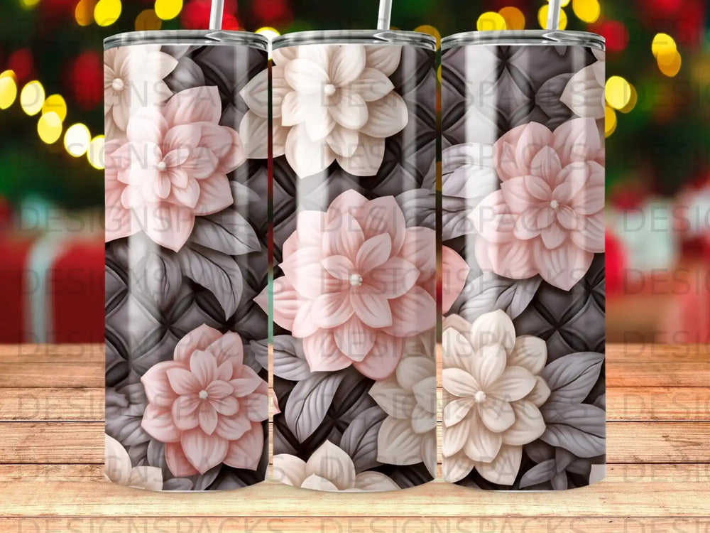 Floral pattern tumbler with pink and cream flowers on a quilted background.