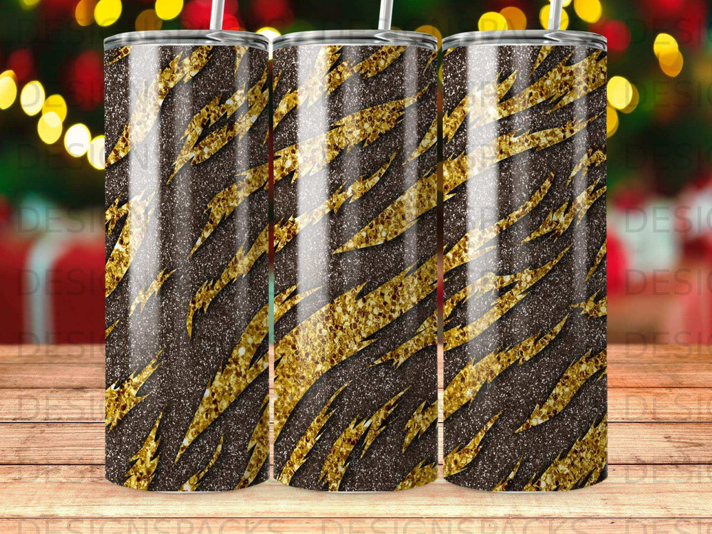Three tumblers with a black glitter background and gold tiger stripe pattern.