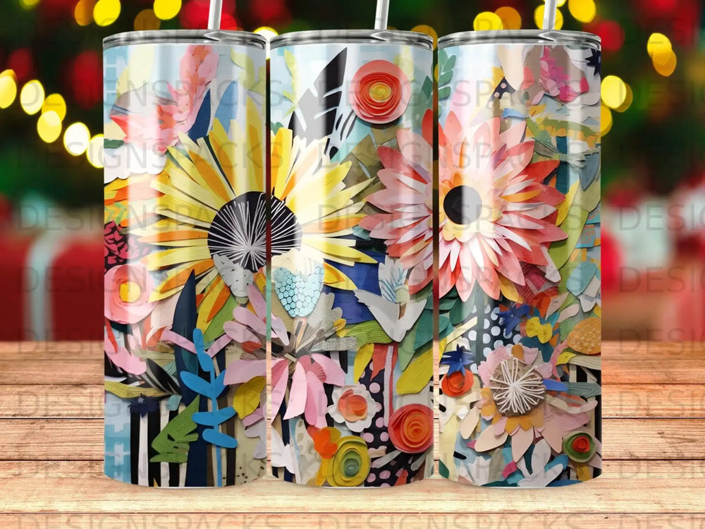 Tumbler with colorful floral and paper craft collage design.