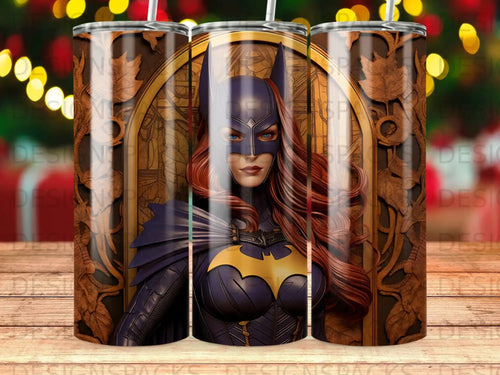 Dark-haired woman in Batman costume with gold bat symbol and decorative background.