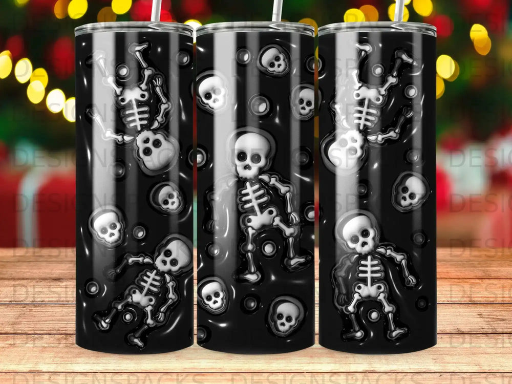 Skeleton and skull pattern on a black tumbler.