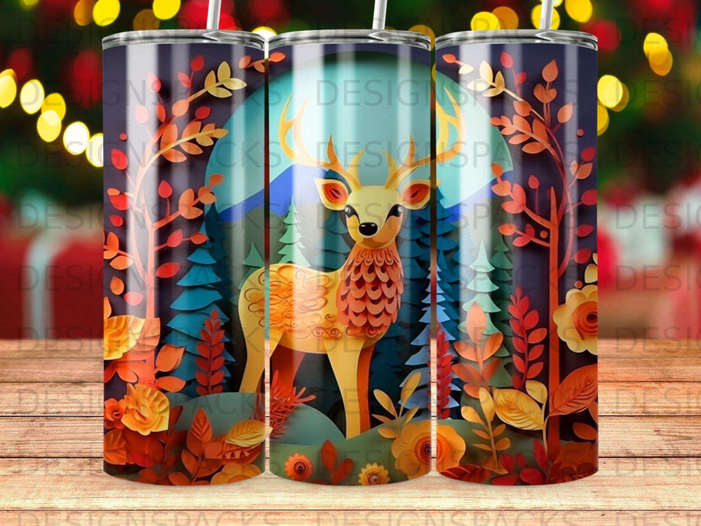 Deer in forest with autumn leaves and floral accents on a patterned tumbler.