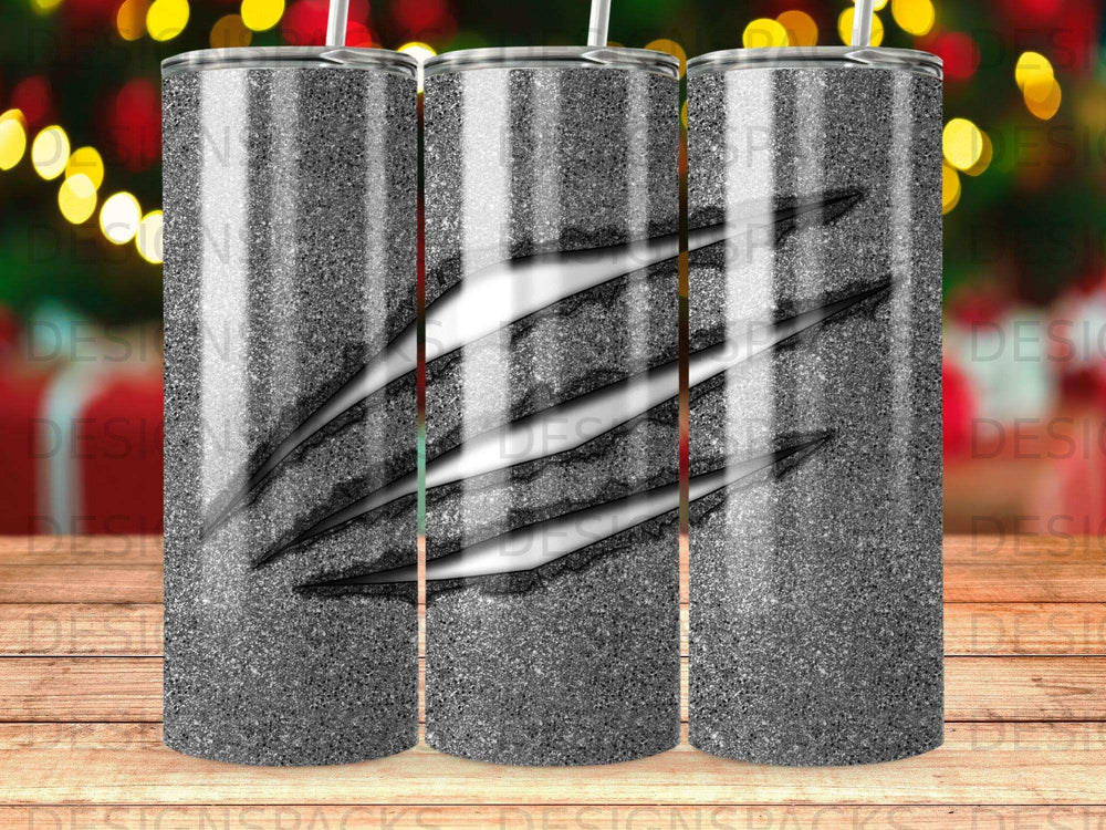 Glitter tumbler with a torn, claw mark design and metallic silver texture.