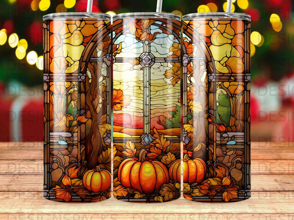 Stained glass window with pumpkins and autumn leaves.