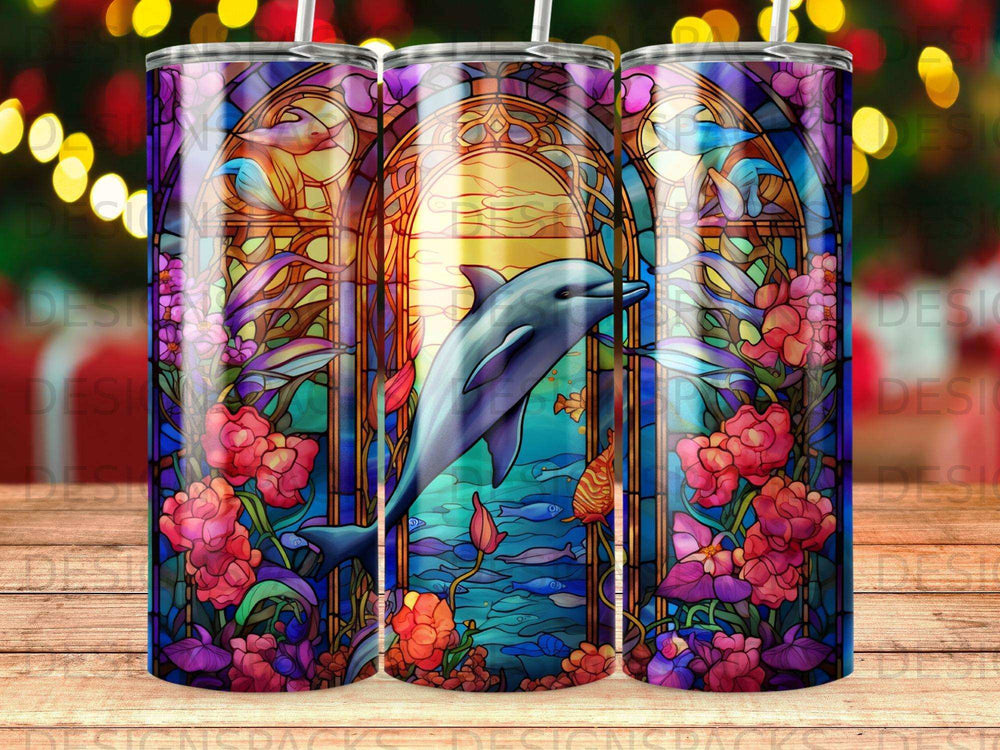Stained glass tumbler featuring a dolphin, fish, and flowers.