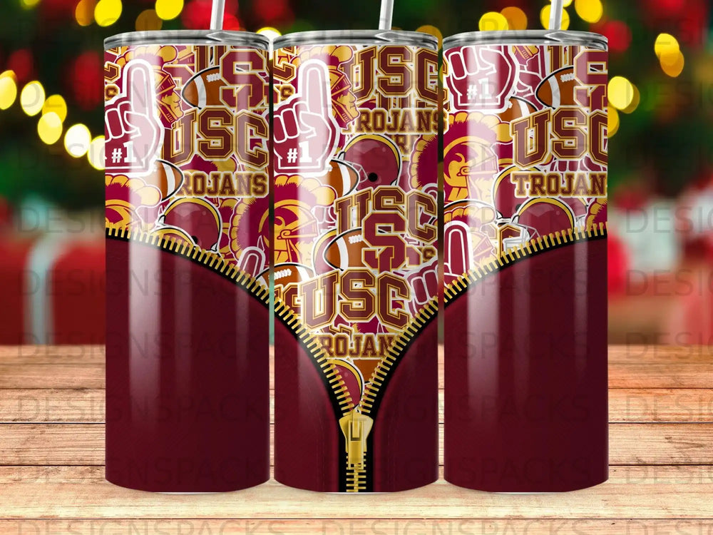 USC Trojans helmet and football pattern on a gold zipper tumbler.