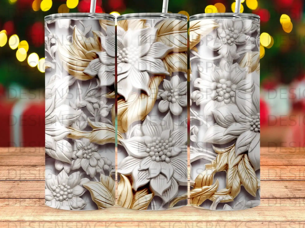 White embossed floral design on a tumbler with a bokeh background.