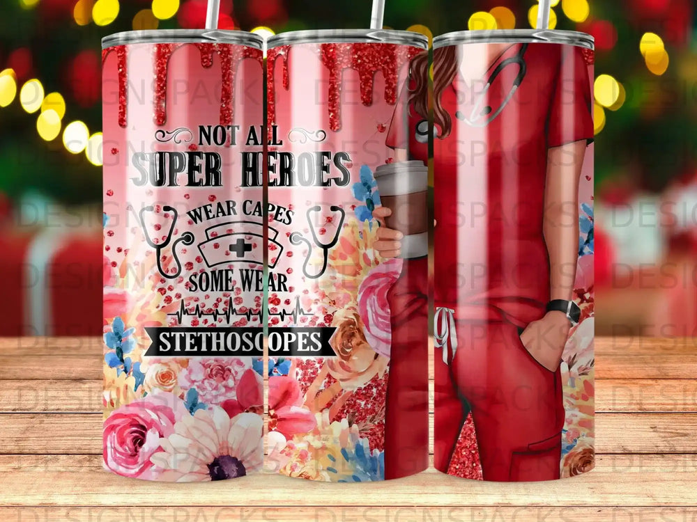 Tumbler with "Not all superheroes wear capes, some wear stethoscopes" text and floral pattern.