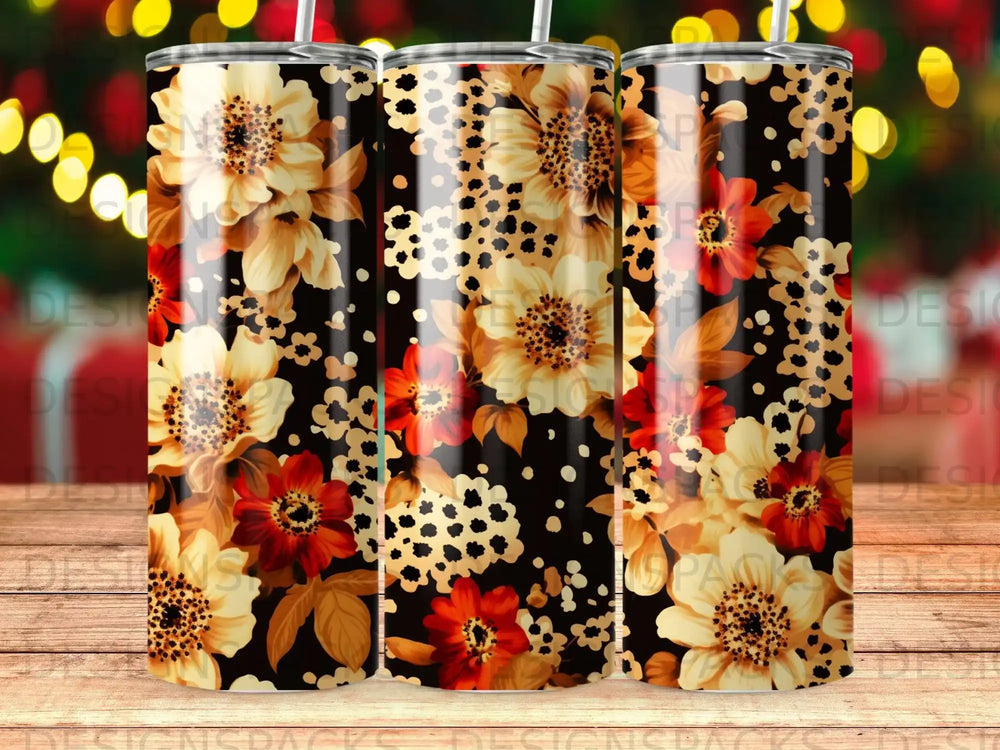 Floral and leopard print tumbler with a straw.