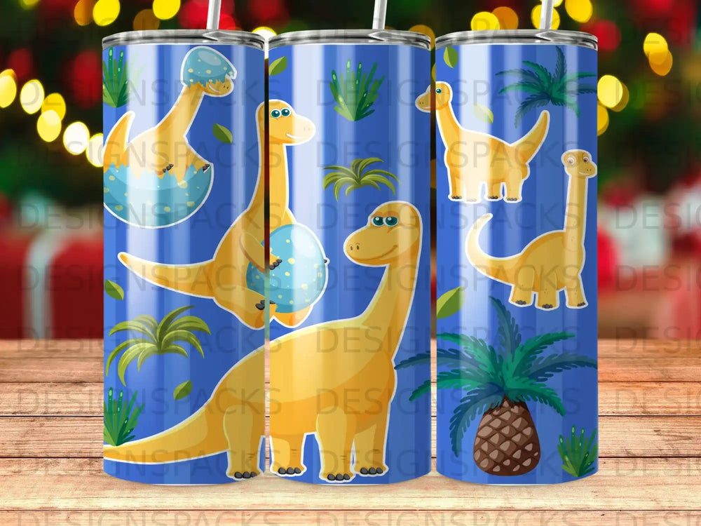 Tumbling blue dinosaur and pineapple pattern on a tumbler.