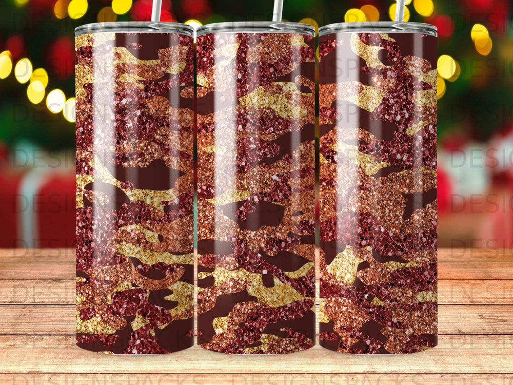 Tumbler with red and gold glitter camouflage pattern.
