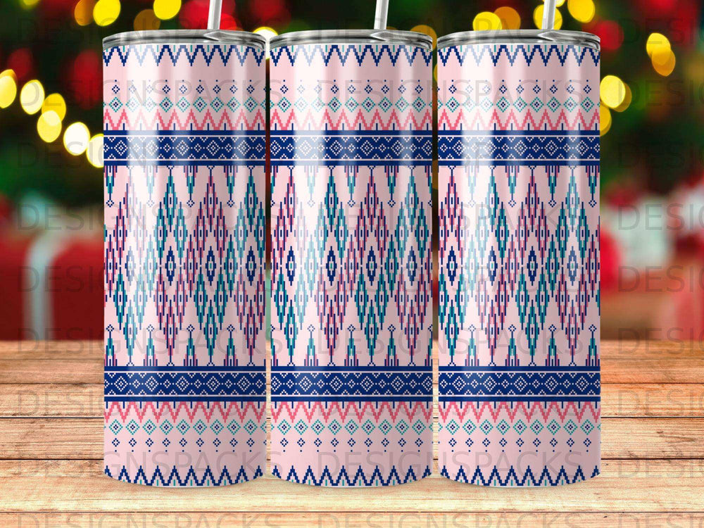 Pink and blue geometric pattern tumbler with zigzag and diamond motifs.