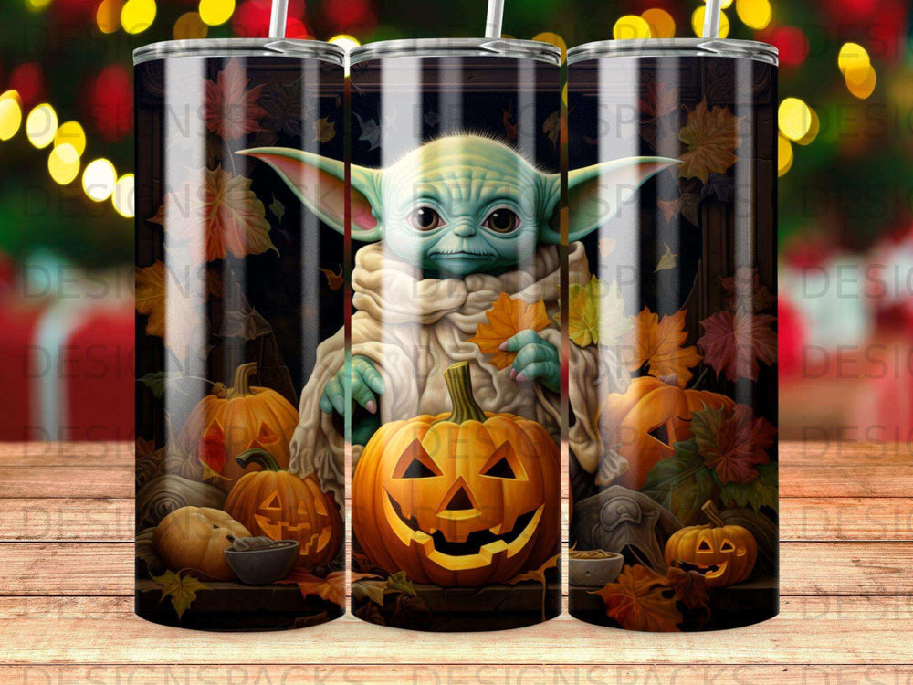 Grogu character with pumpkins and autumn leaves on a tumbler.