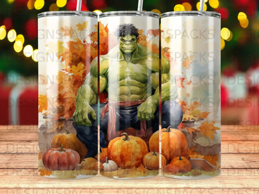 The Hulk crouches surrounded by pumpkins and autumn leaves.