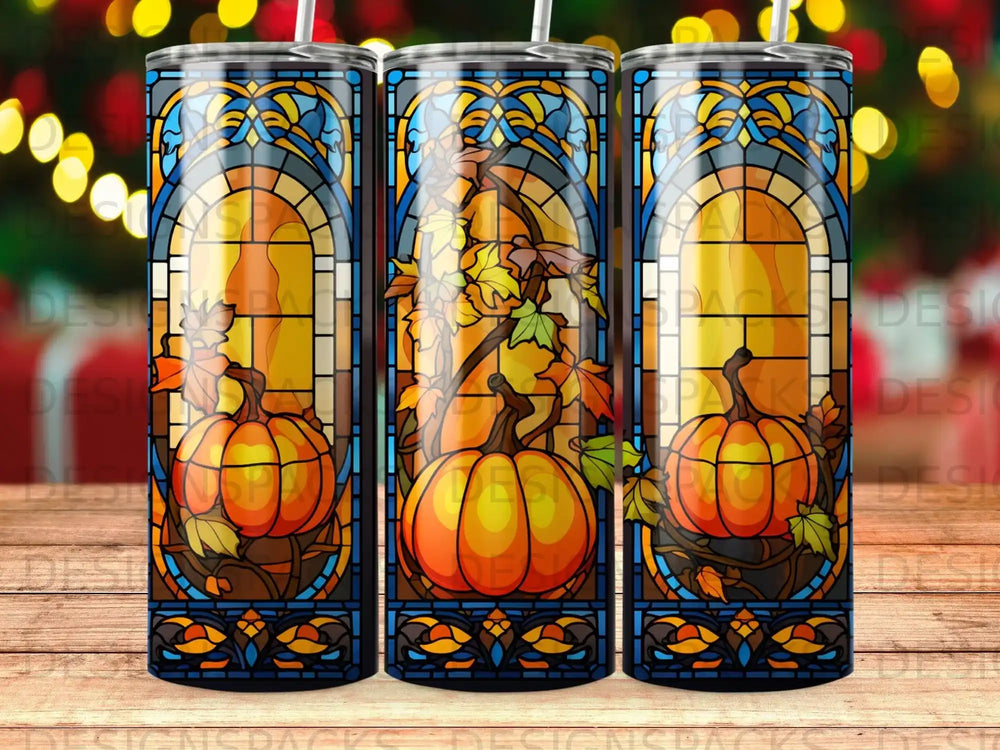 Stained glass tumbler with pumpkins and autumn leaves pattern.