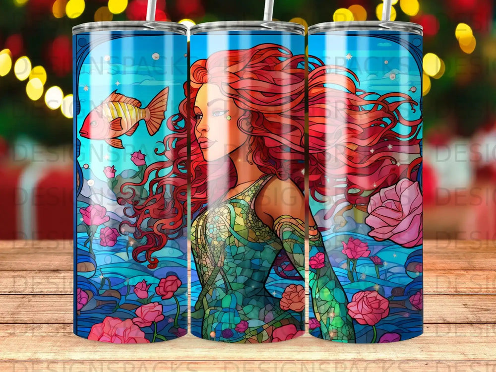Mermaid with flowing red hair and a fish swimming beside her.