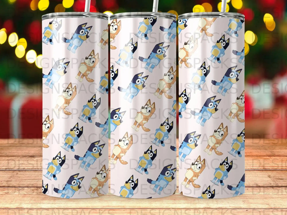 Bluey and Bingo characters pattern on a tumbler cup, blurred festive background.