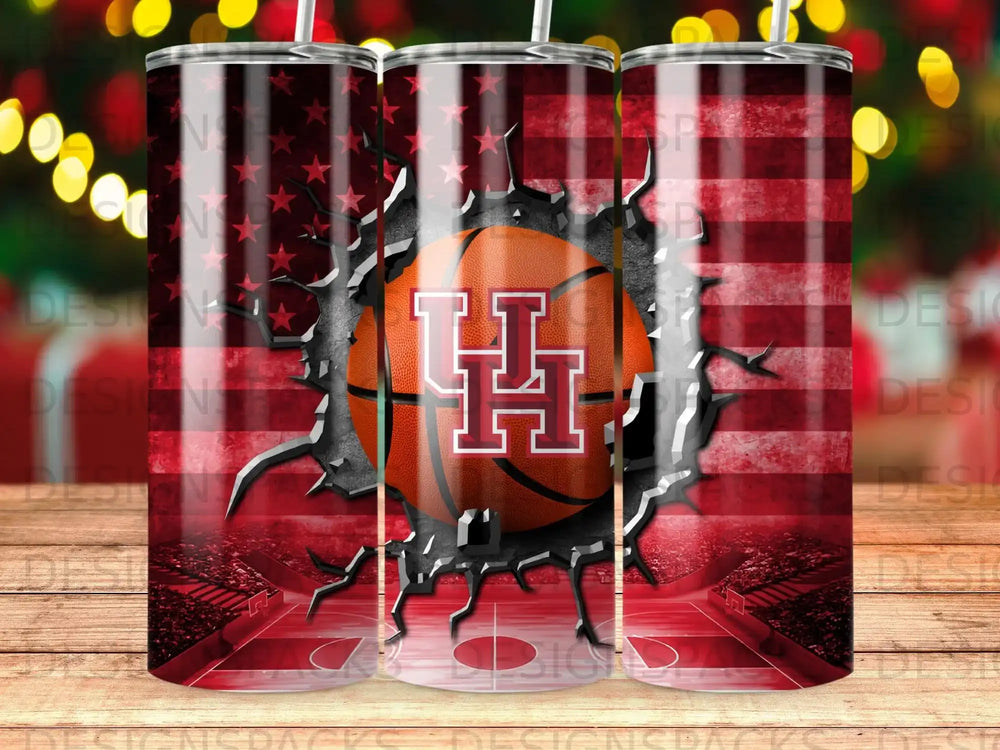 Basketball with Cougars logo on torn American flag over court.