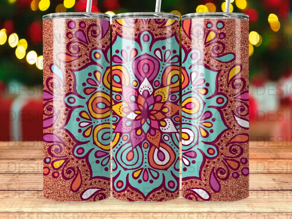 Three tumblers with colorful mandala patterns and glitter accents.