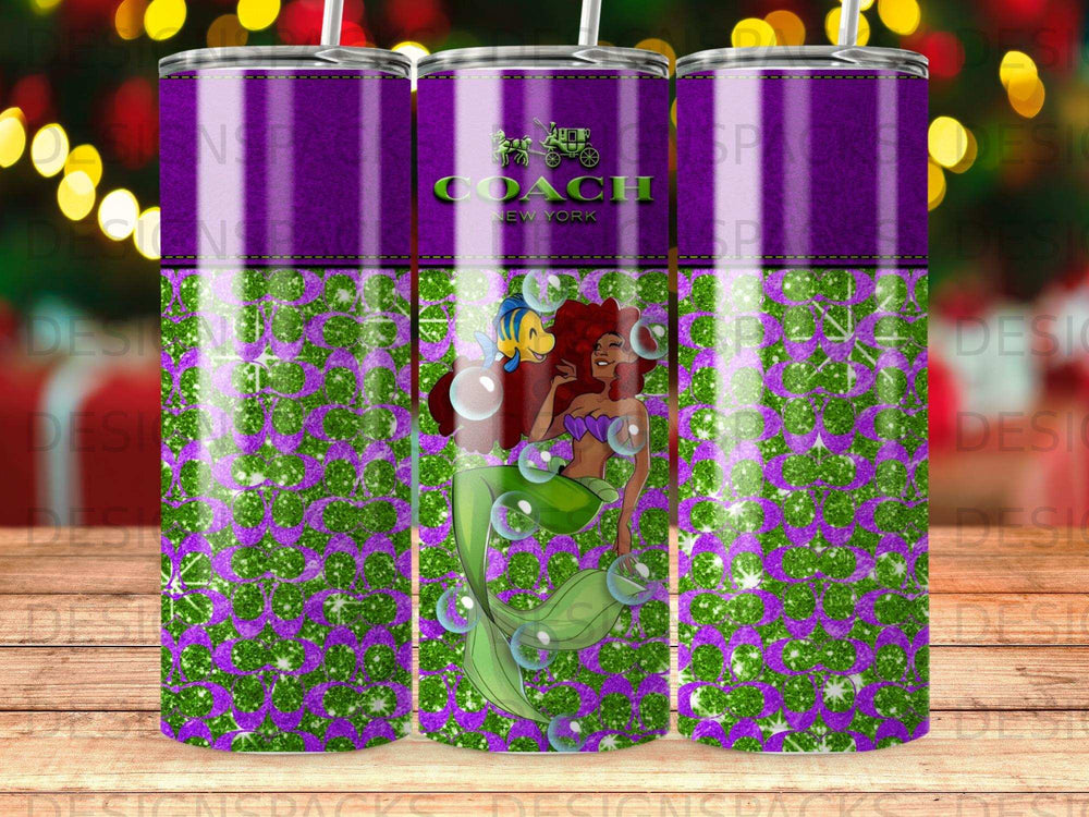 Coach New York tumbler with Ariel and Flounder on a purple glitter background.