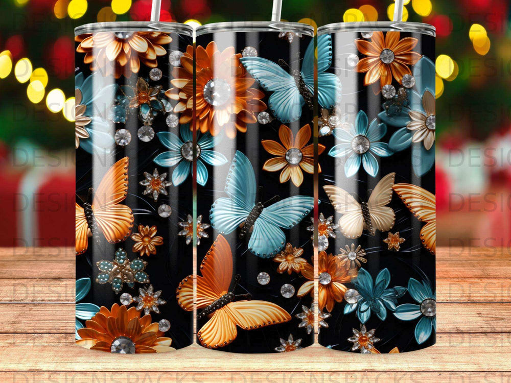 Black tumbler with orange and blue butterflies and floral designs.