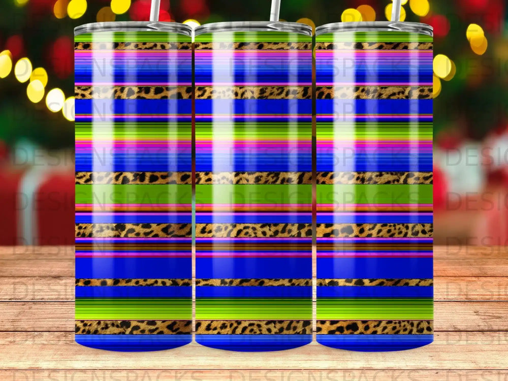 Tumbler with colorful stripes and leopard print pattern.