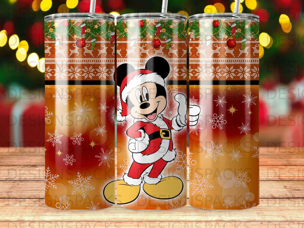 Mickey Mouse in a Santa suit on a festive Christmas tumbler.