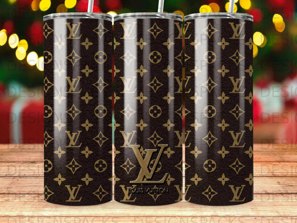 Louis Vuitton monogram tumbler with gold accents and straws.