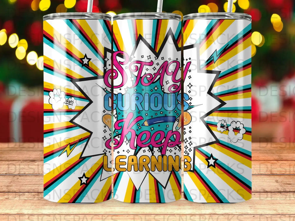 Tumbler with "Stay Curious Keep Learning" text on a colorful comic book background.