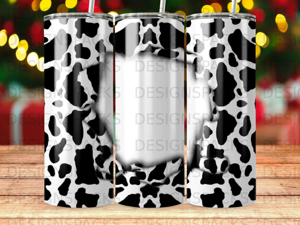 Cow print tumbler with a white-bordered central cutout.