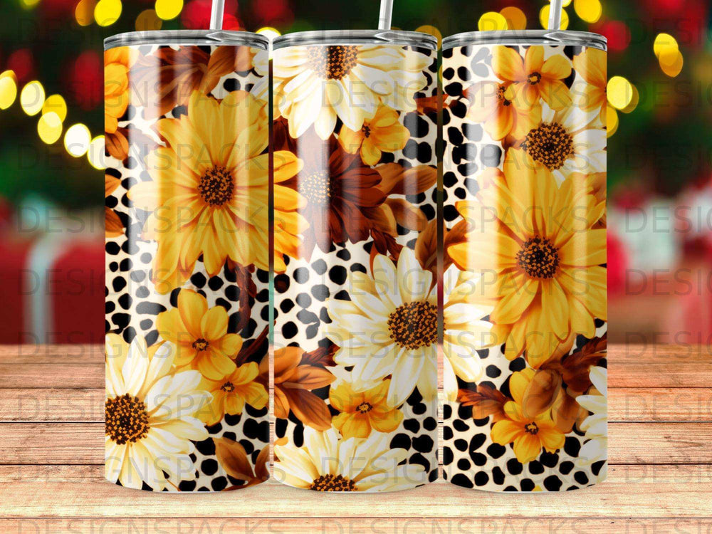 Floral pattern with yellow flowers and brown leaves on a black and white animal print background.