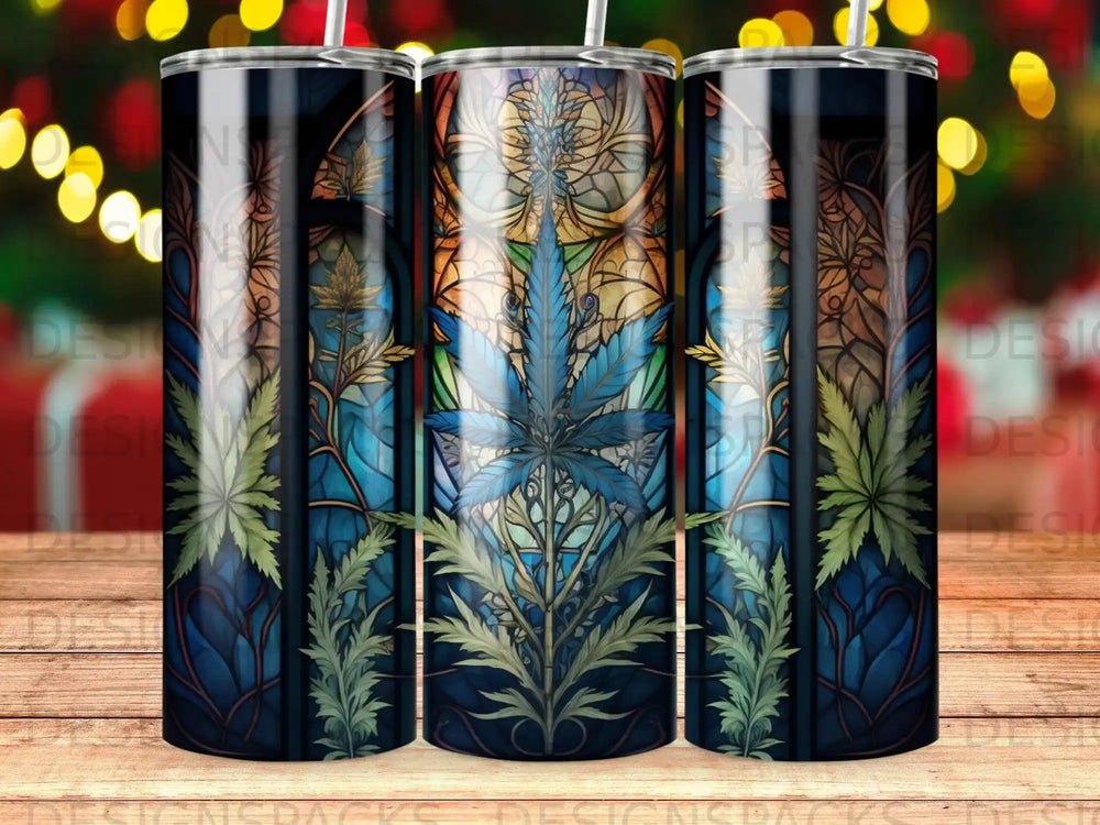 Three tumblers with a stained glass cannabis leaf design.
